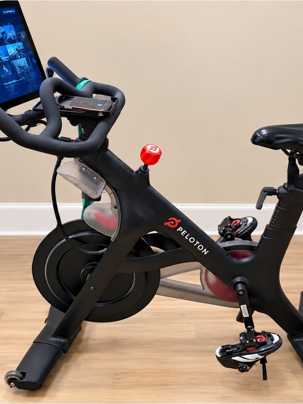 Peloton Stationary Bike with Black Foam Handlebars and Black Tablet Holder OBO